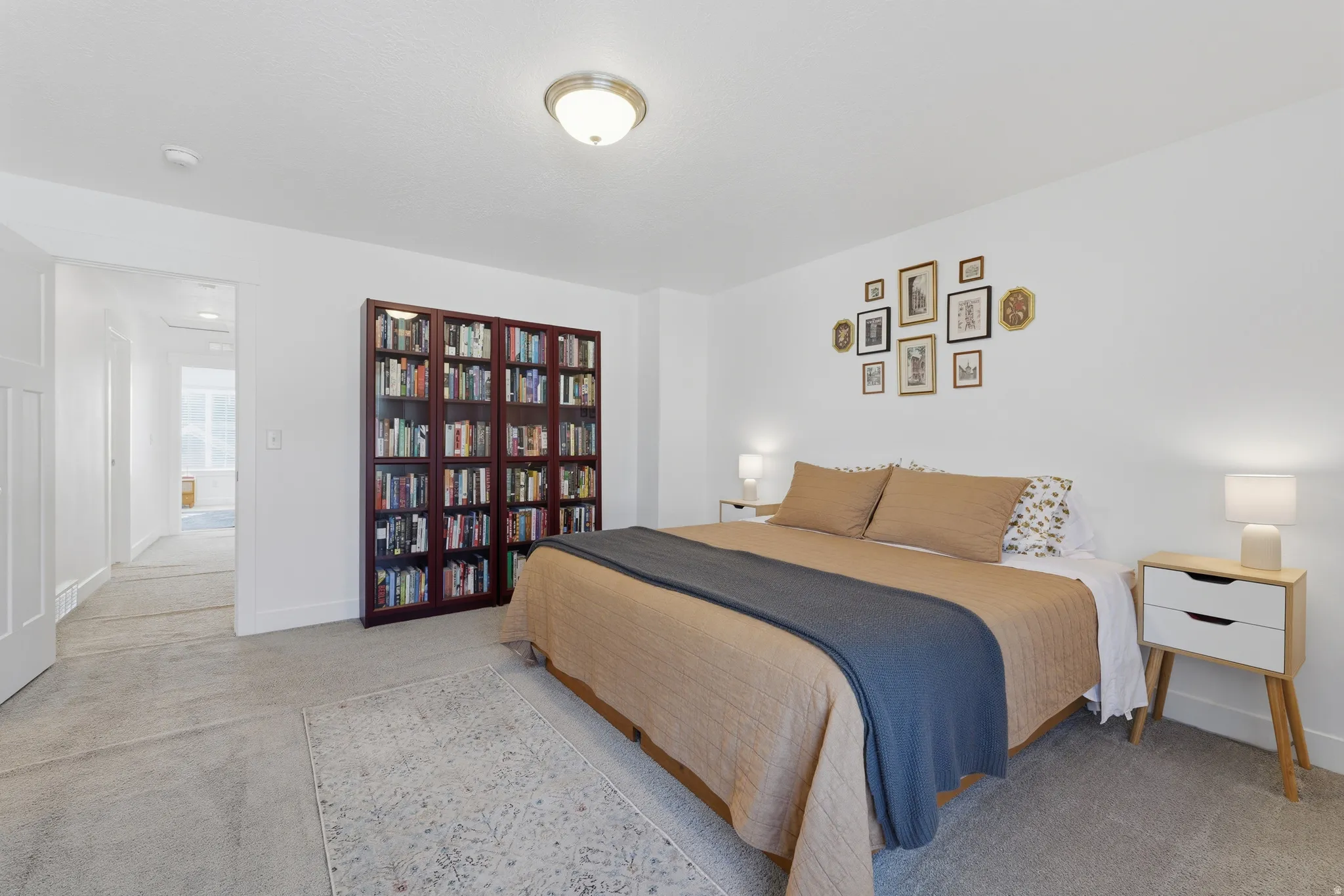 White walls with neutral carpeting