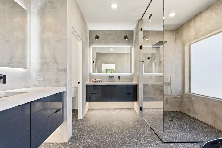 Walk-in shower with a glass enclosure
