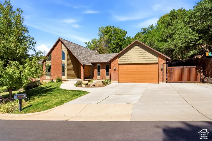 Brick and wood-sided exterior with an A-frame architectural element