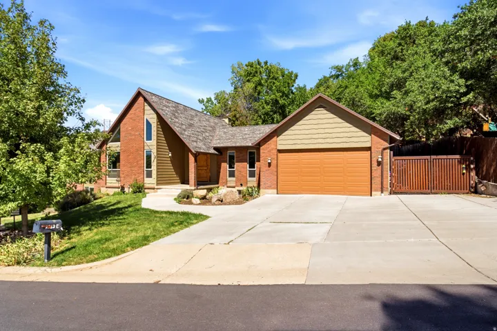 Brick and wood-sided exterior with an A-frame architectural element