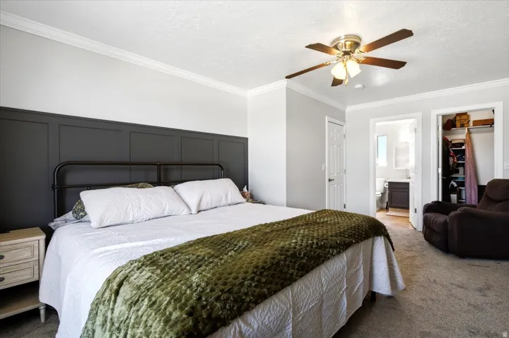 Other updates include newer furnace & central air (2019), whole house humidifier, water heater (2025), updated lighting, new baseboards, crown molding,& water softener.