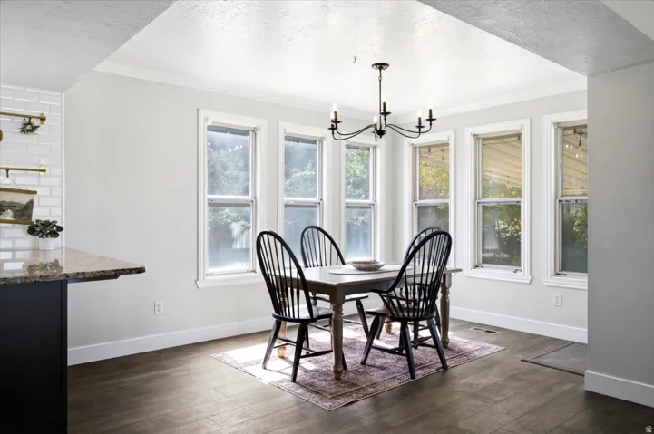 Beautiful dining area overlooks a lush yard