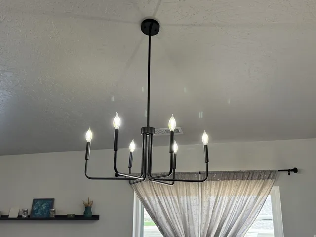 Black finish chandelier with six candelabra-style bulbs