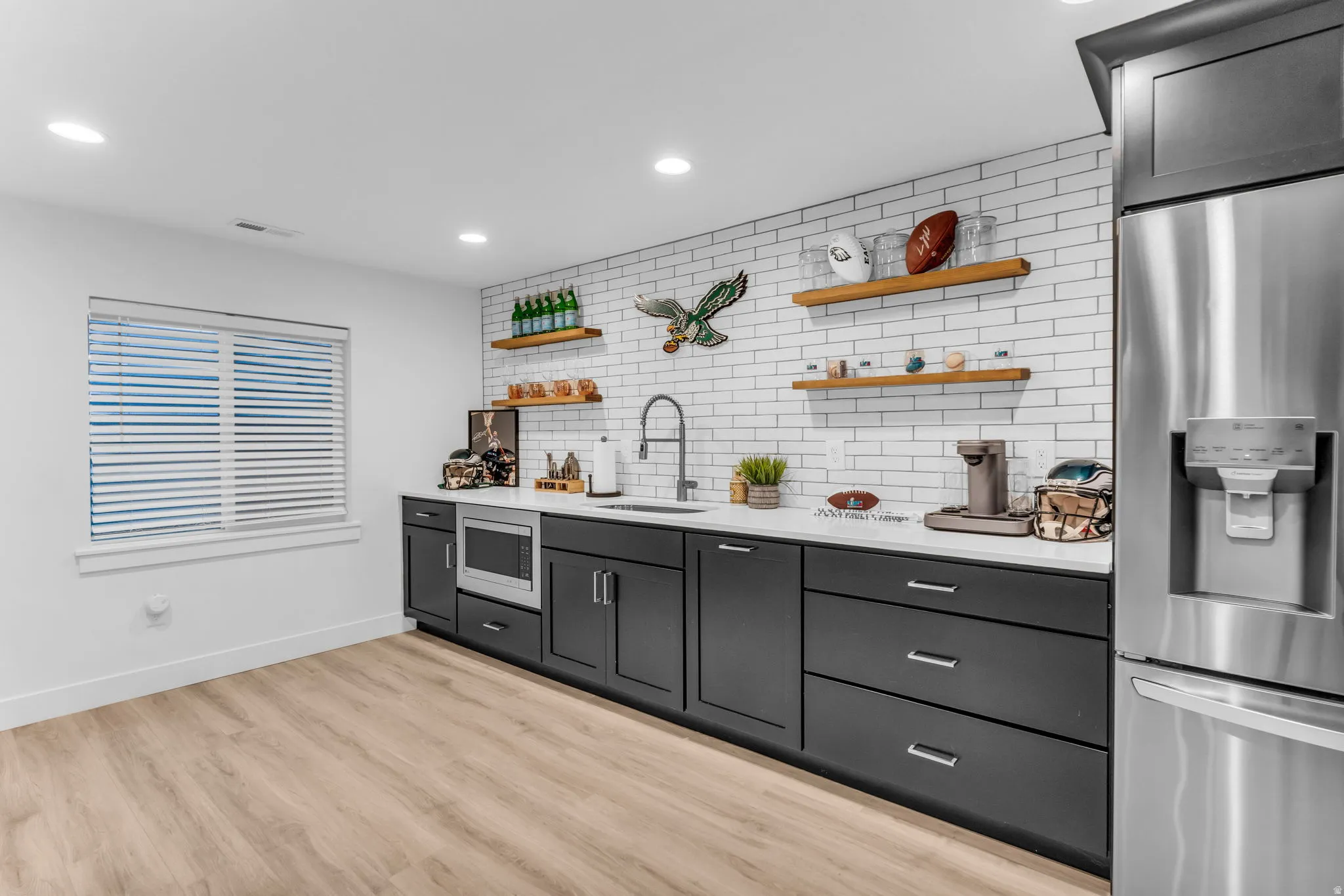 Wood-finish flooring with white walls