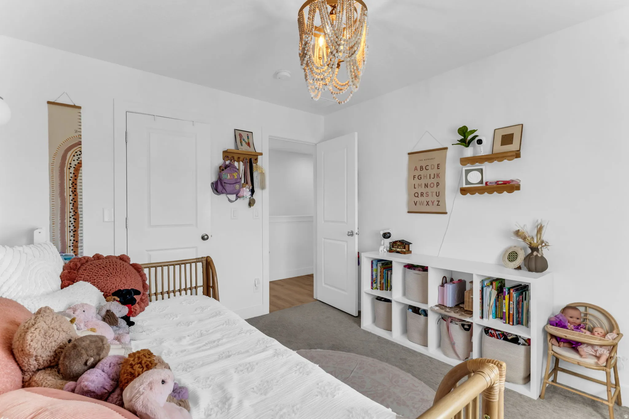 White walls with a decorative beaded chandelier