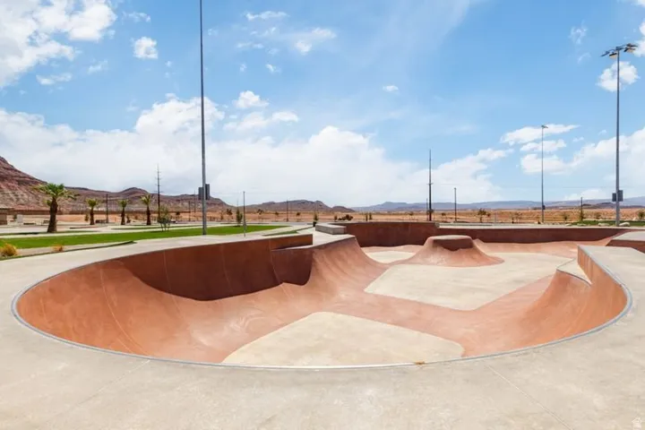 Concrete skate park featuring varied bowl depths and transition elements