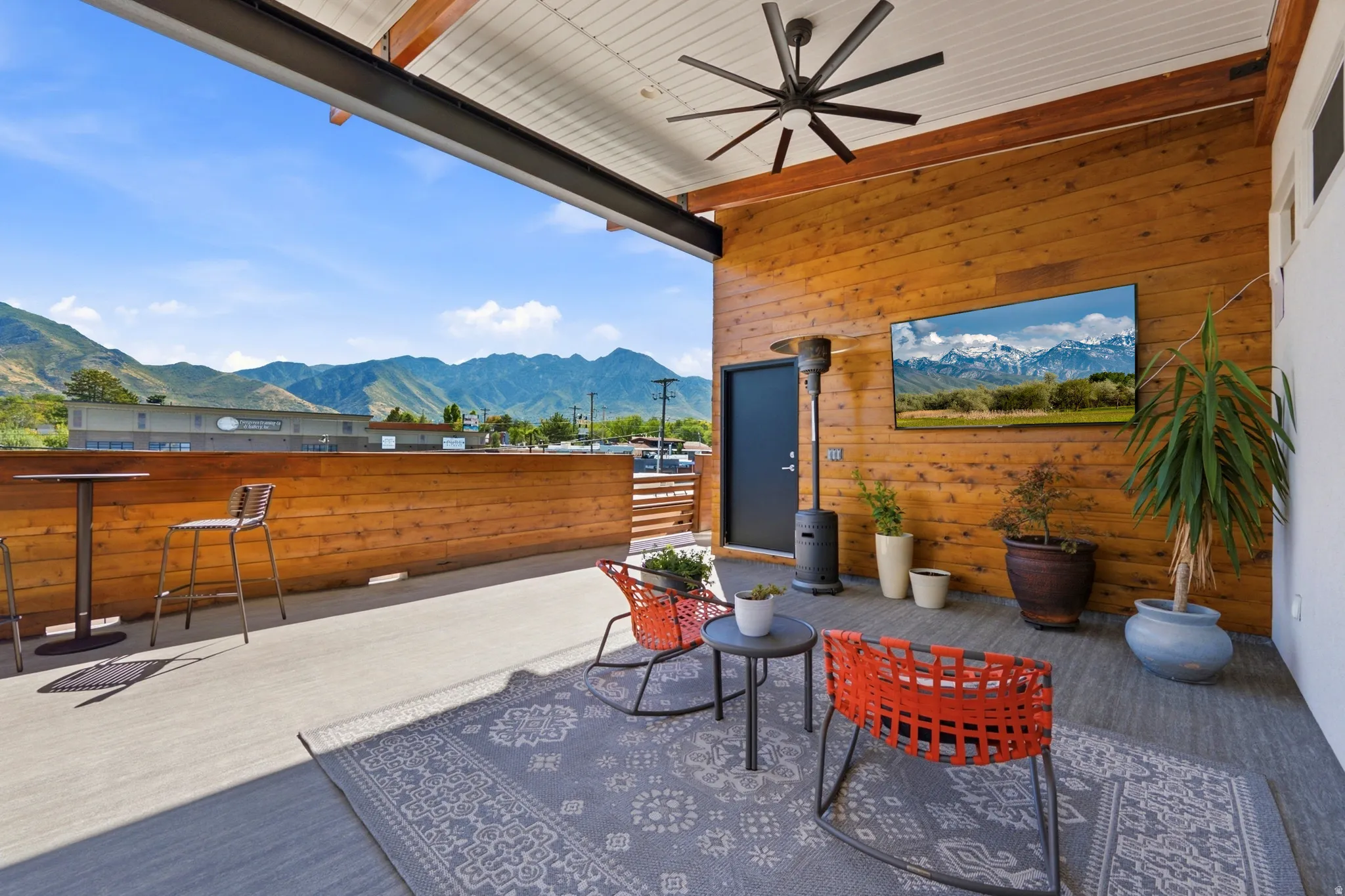 Second floor deck with flat screen tv area.  Storage close.