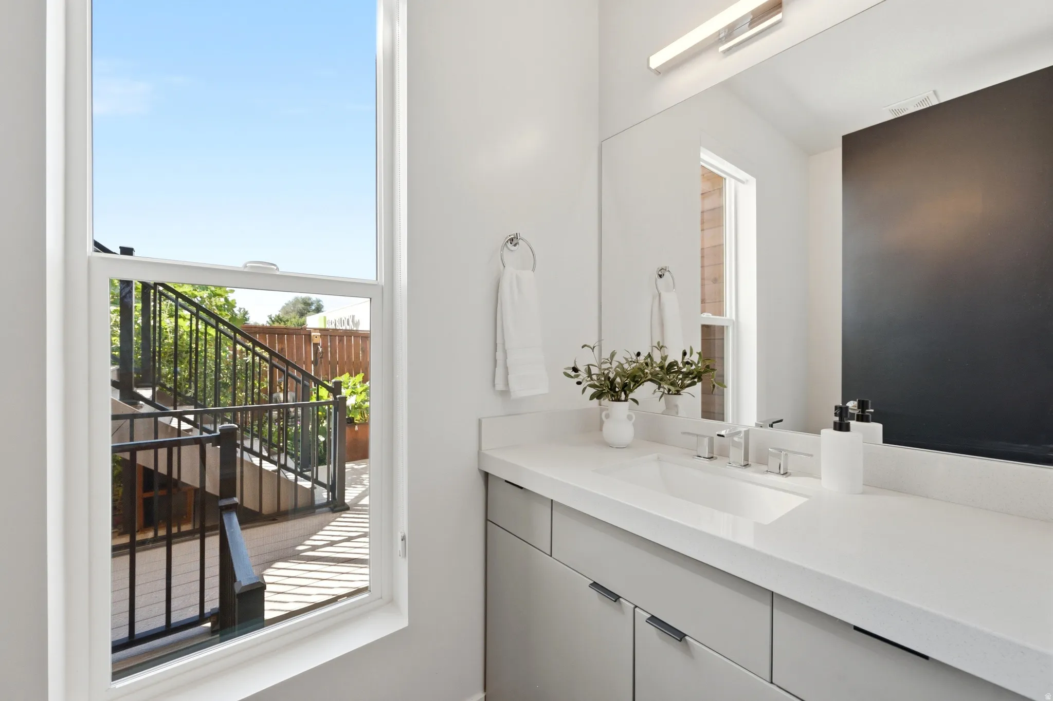 Half bath overlooking backyard