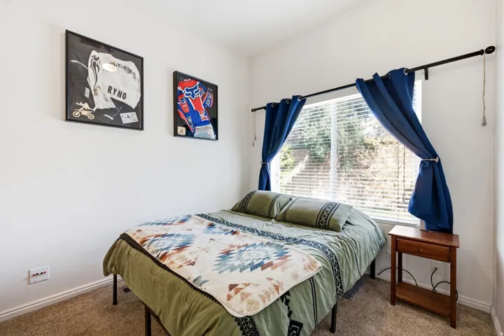 Window with blinds and curtain rod