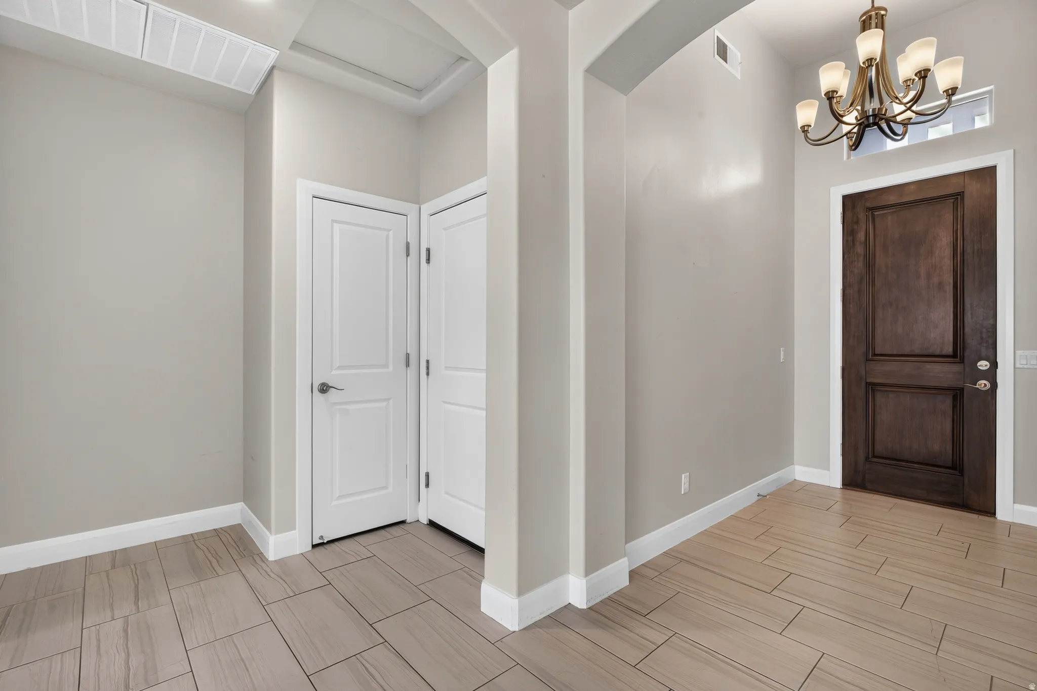 Wood-look tile flooring with a neutral wall color