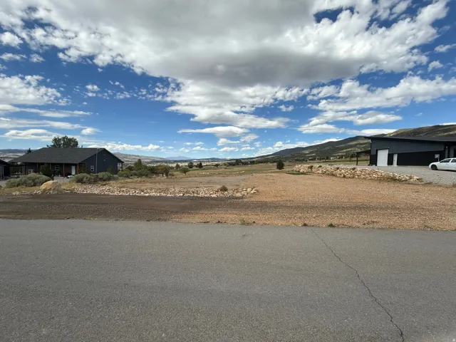 Expansive buildable lot with distant mountain topography