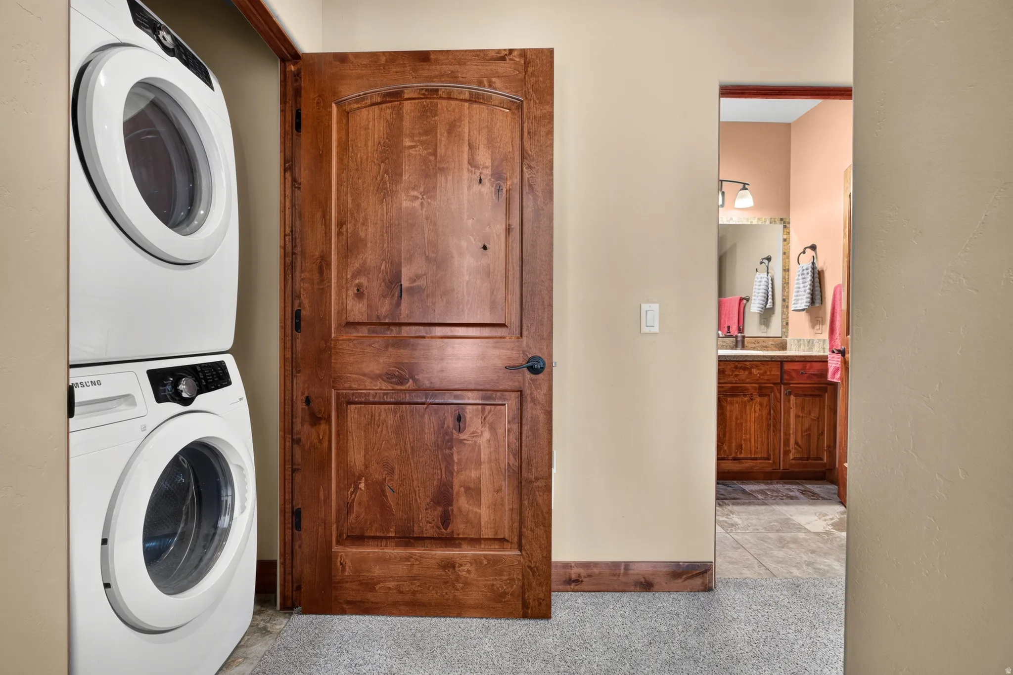 Stacked washer and dryer units