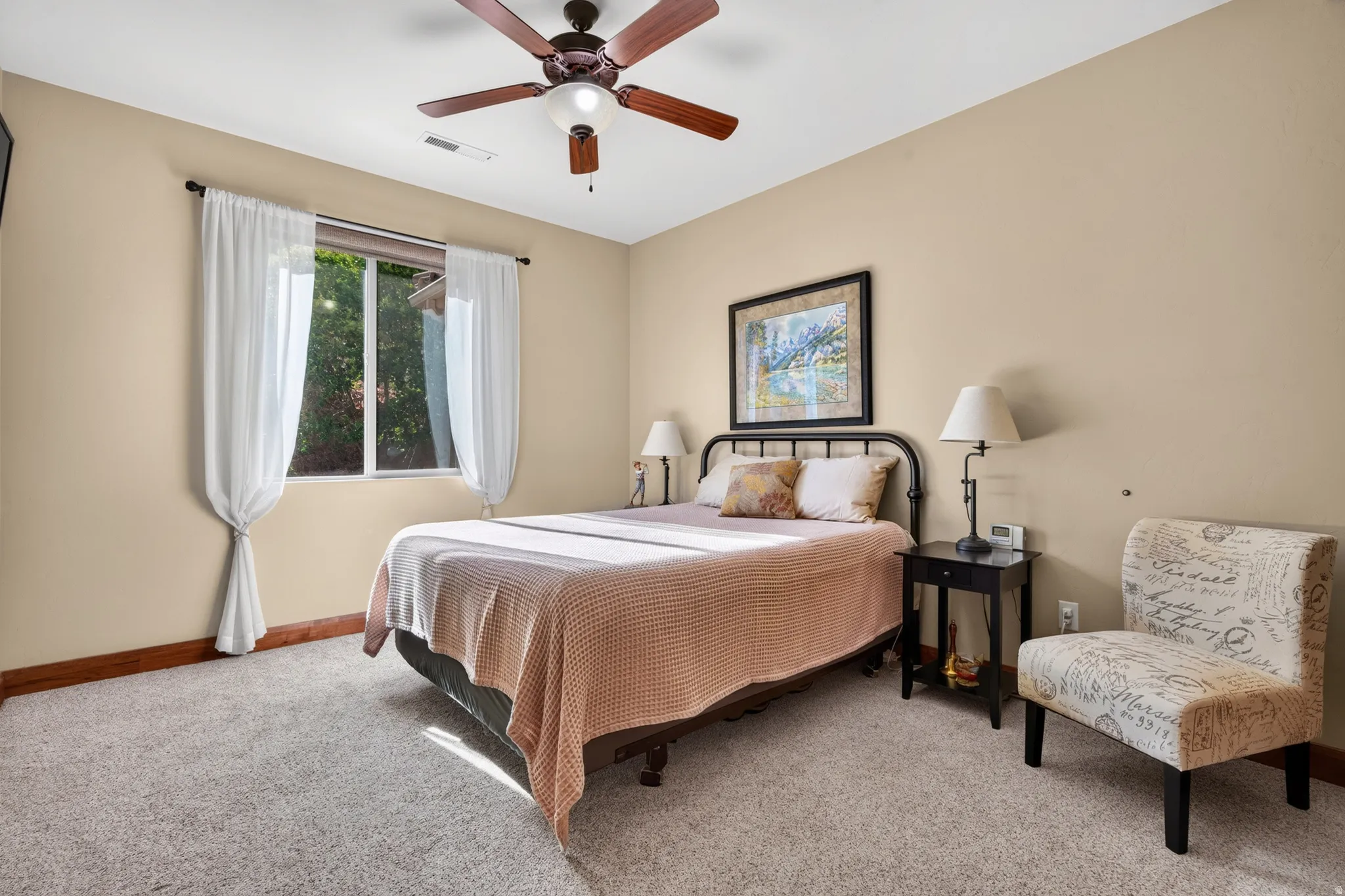 Wall-to-wall carpeting and neutral wall tones