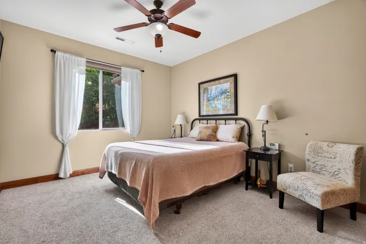 Wall-to-wall carpeting and neutral wall tones