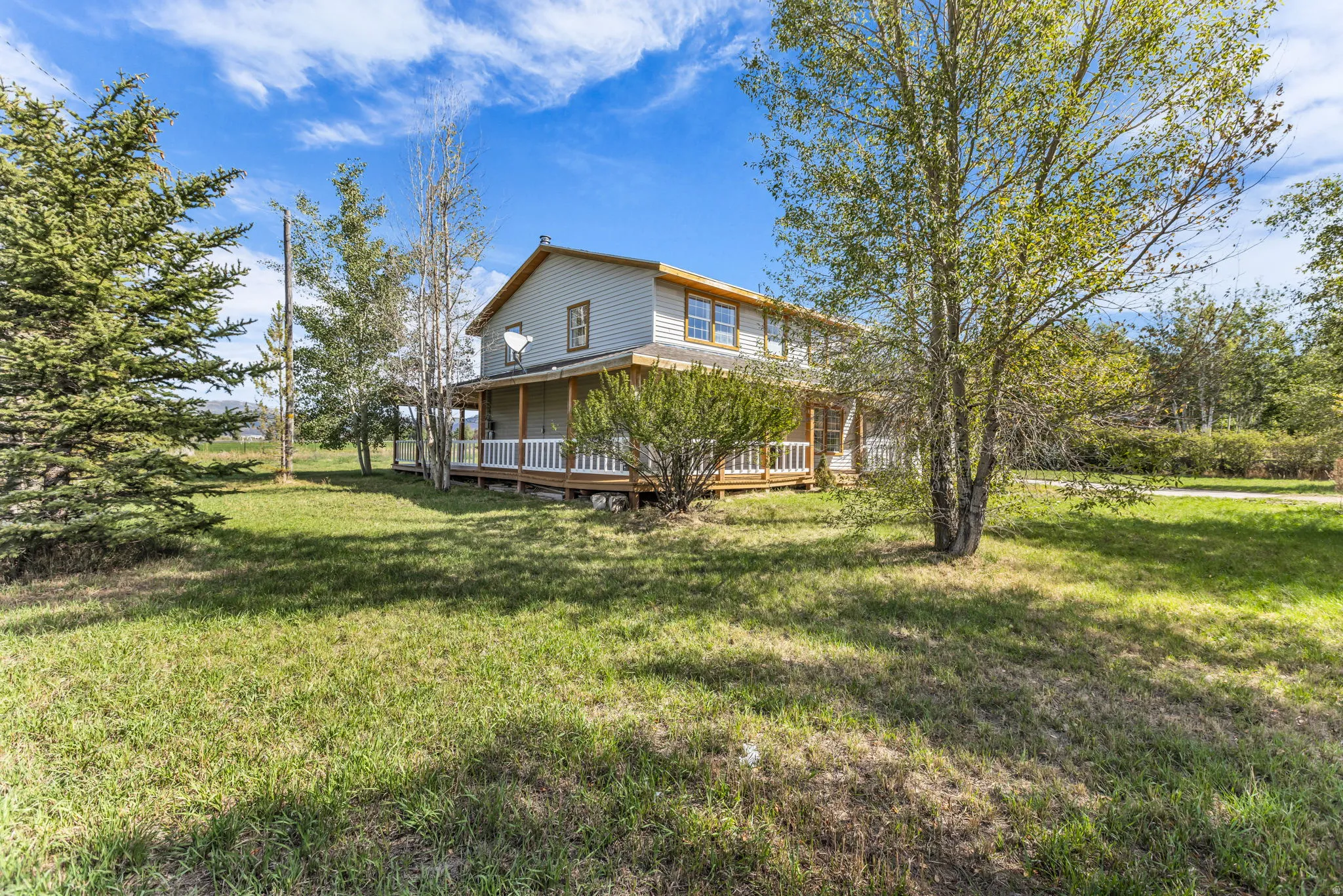 Two-story residence with siding exterior