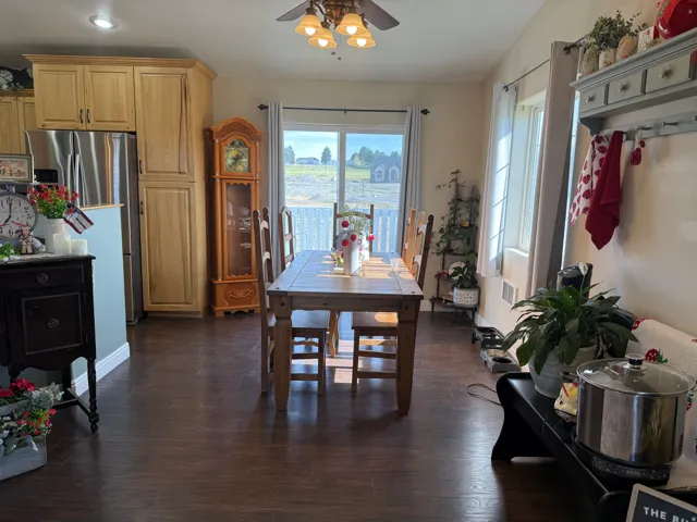 Dark wood-finish flooring throughout