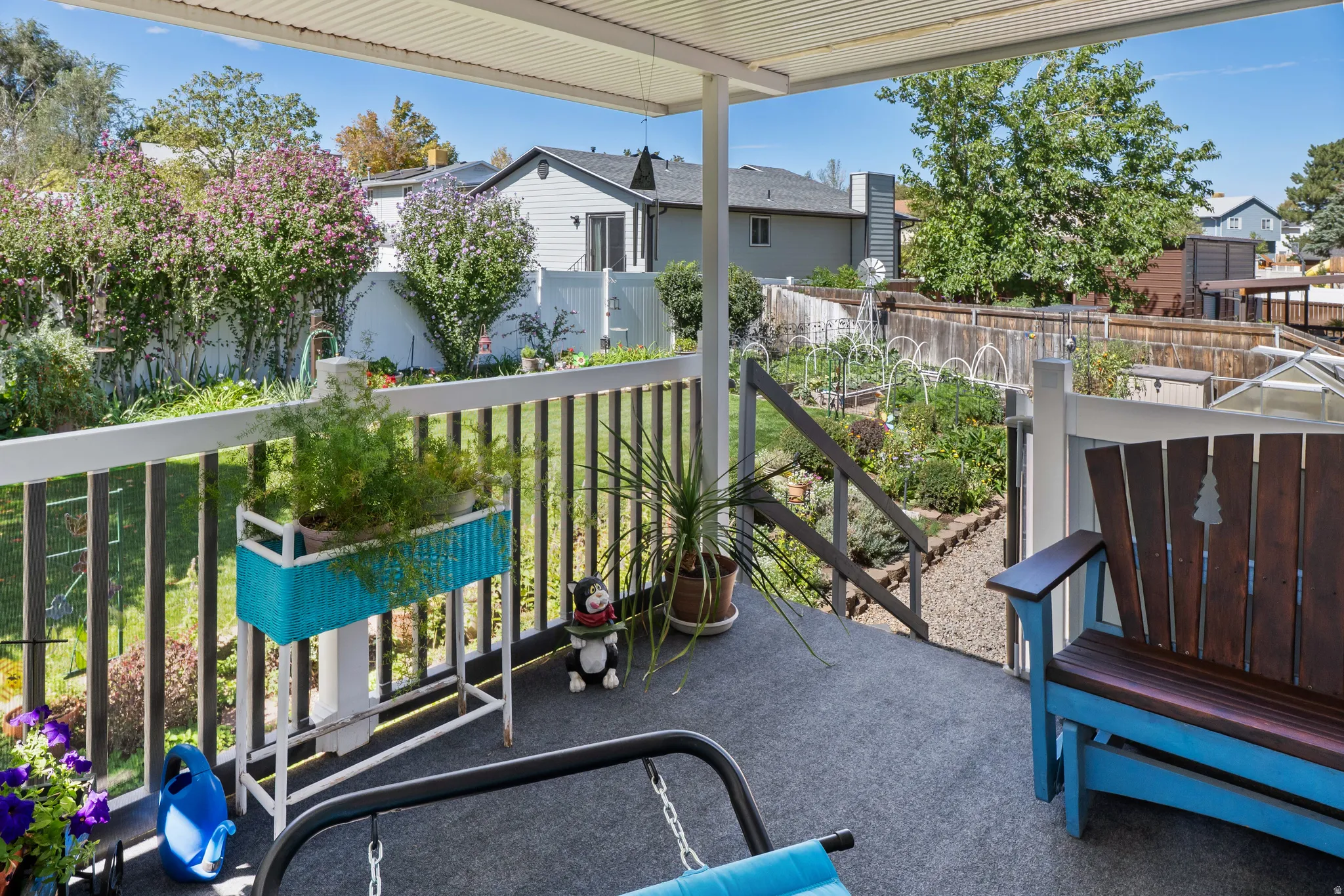 Oversized covered deck, perfect for a BBQ with family and friends, of sit quietly enjoying the sound of the gentle rain as you read your favorite book