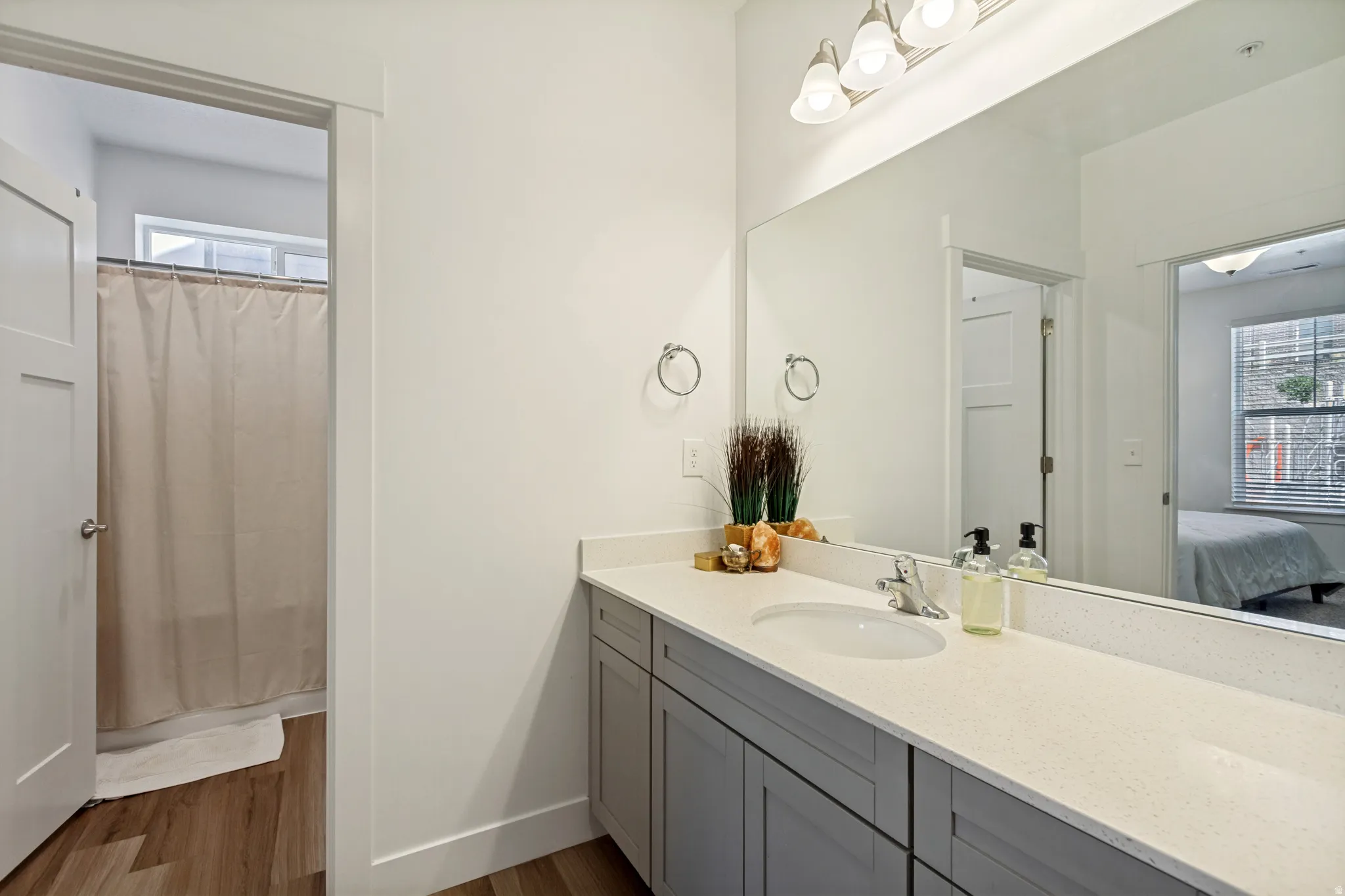 Primary bath with separate tub & toilet area.
