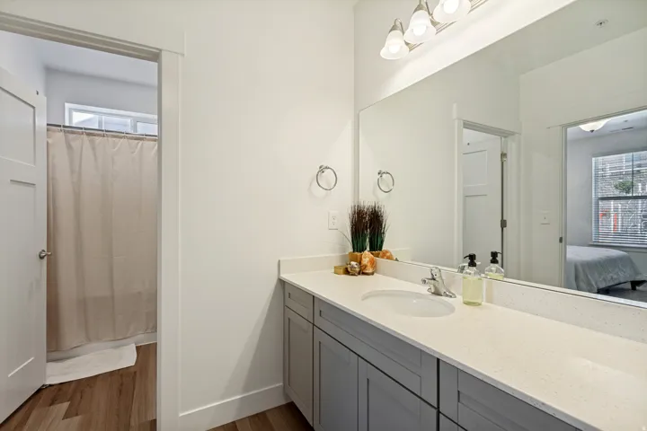Primary bath with separate tub & toilet area.