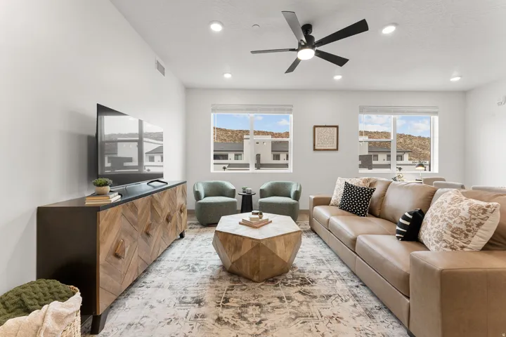 Recessed lighting and ceiling fan overhead