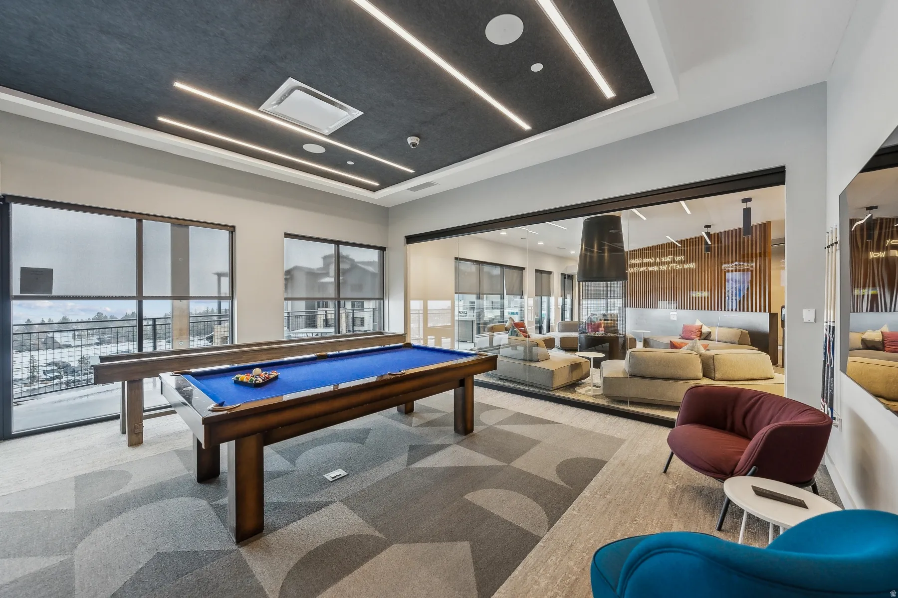 Entertainment room featuring a billiards table, geometric patterned carpeting, and recessed lighting