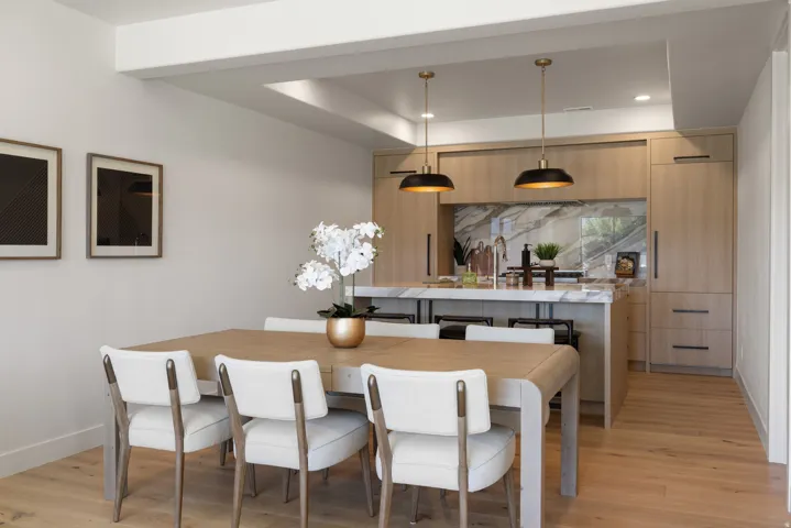 Wood-finish flooring throughout, paired with a spacious dining area