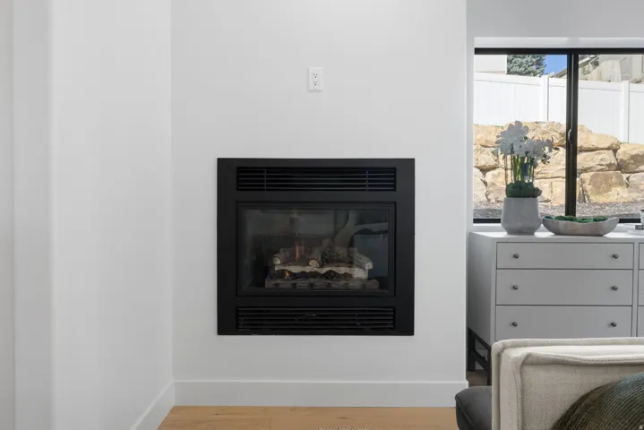 Built-in fireplace with a black metal frame