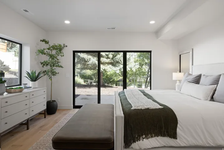 Hardwood flooring and recessed lighting throughout
