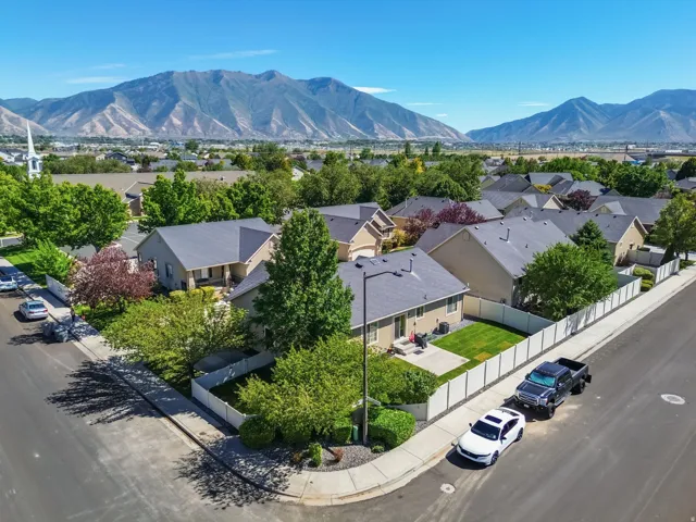 Expansive mountain backdrop with a residential neighborhood