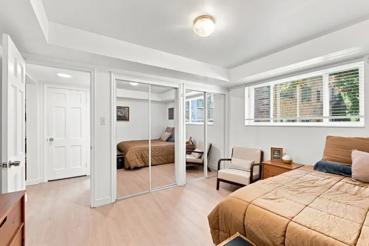 Spacious bedroom with a new window, large double-sided closet with mirror.