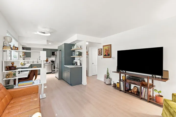 Open-concept living space looking into the kitchen