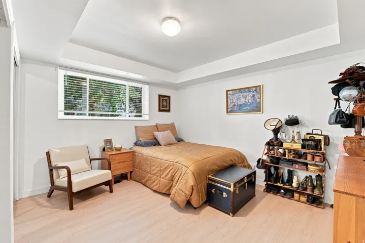 Spacious bedroom with new window.