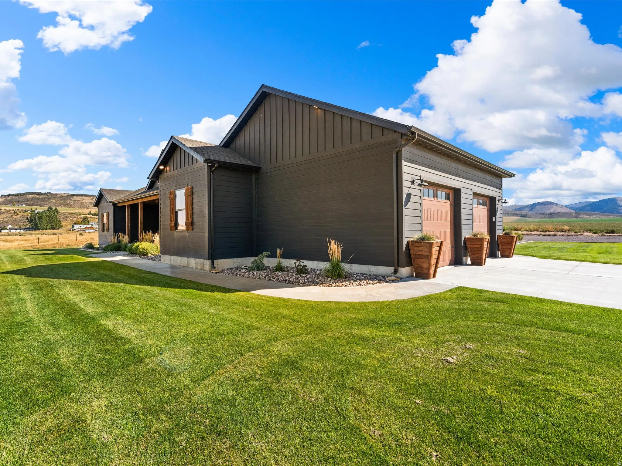 Dark gray horizontal siding with vertical siding accents