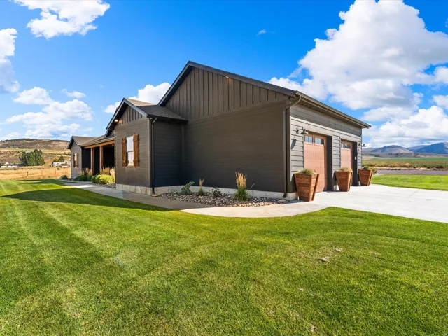 Dark gray horizontal siding with vertical siding accents