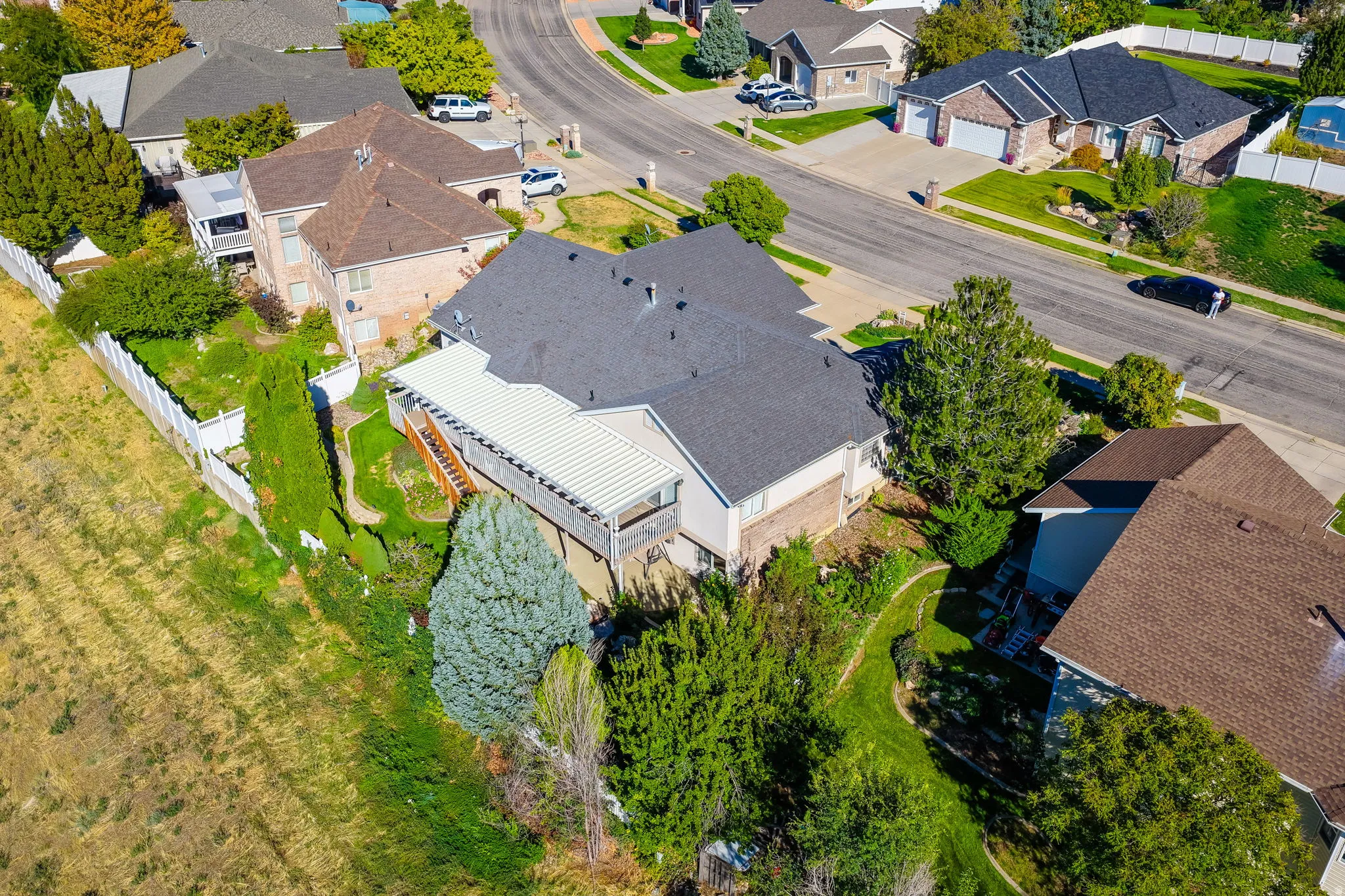 Multi-level property with a rear deck and covered patio