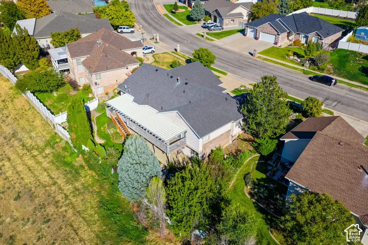 Multi-level property with a rear deck and covered patio