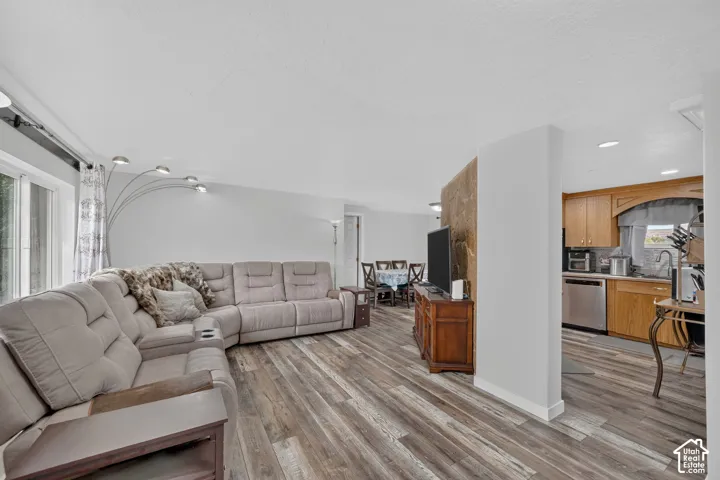 Wood-finish flooring throughout, with a neutral wall color