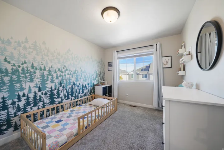 Recessed window with white trim, carpeting, and a flush mount ceiling light fixture