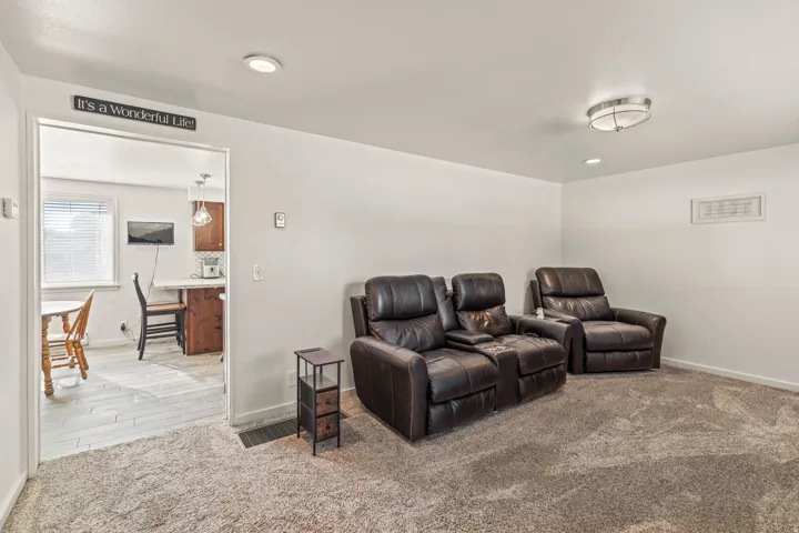 Recessed ceiling lighting, flush mount ceiling fixture, and light-toned carpet