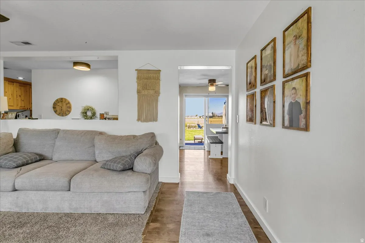 Wood-finish flooring and white walls throughout