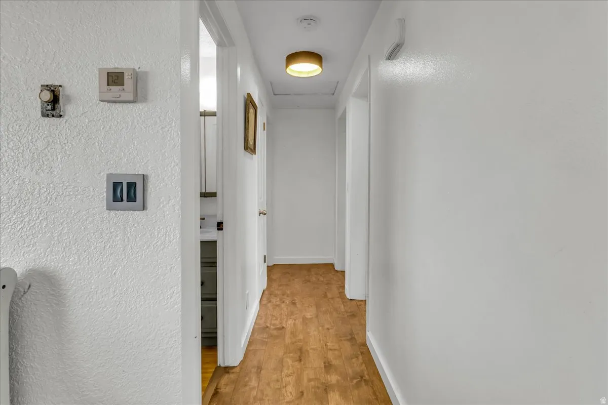 Wood-finish flooring with crisp white walls