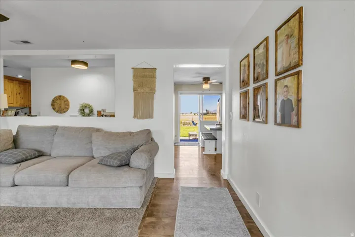 Wood-finish flooring and white walls throughout