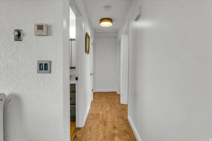 Wood-finish flooring with crisp white walls