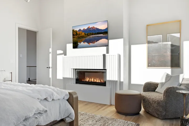 Contemporary fireplace with a black firebox and a textured white surround