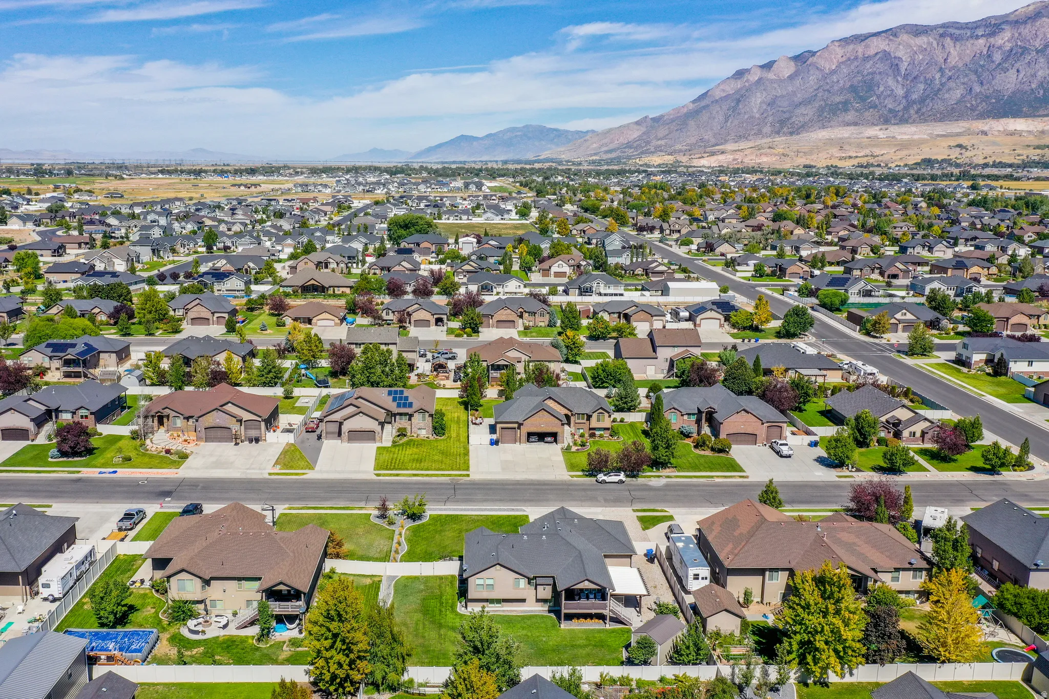 Residential neighborhood with paved streets and established landscaping