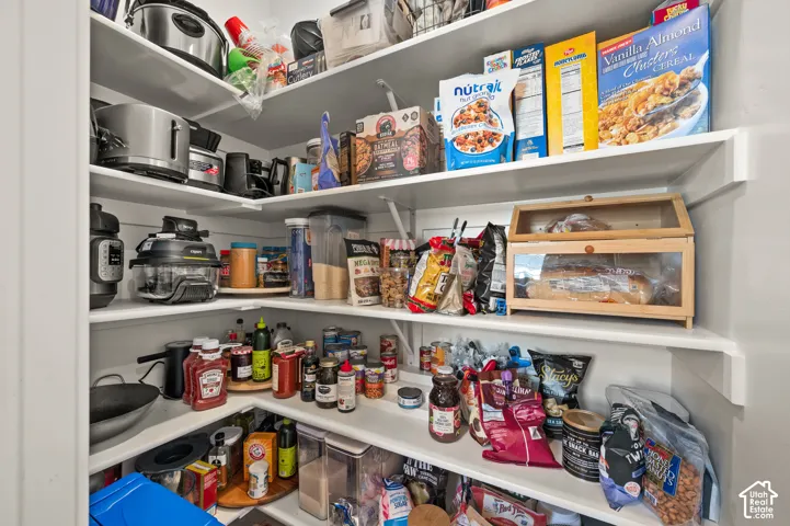 Custom built-in shelving providing ample storage