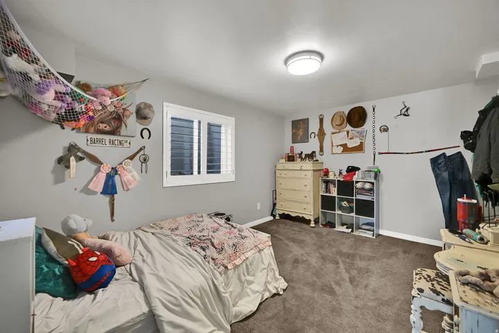 Wall-to-wall carpeting and a ceiling-mounted light fixture