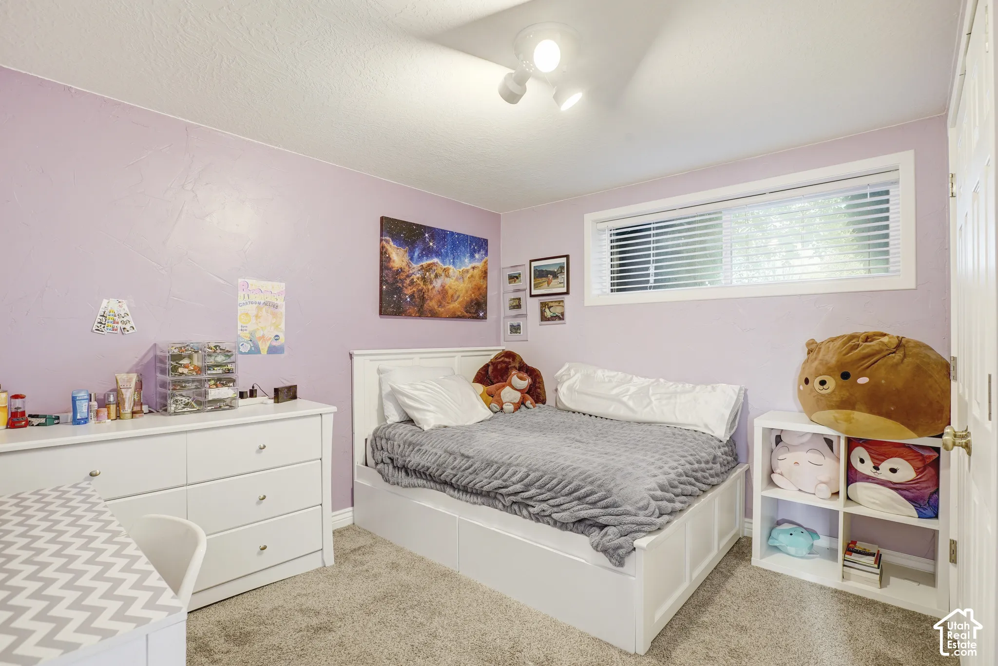 Recessed window with blinds, white trim, and a white interior door