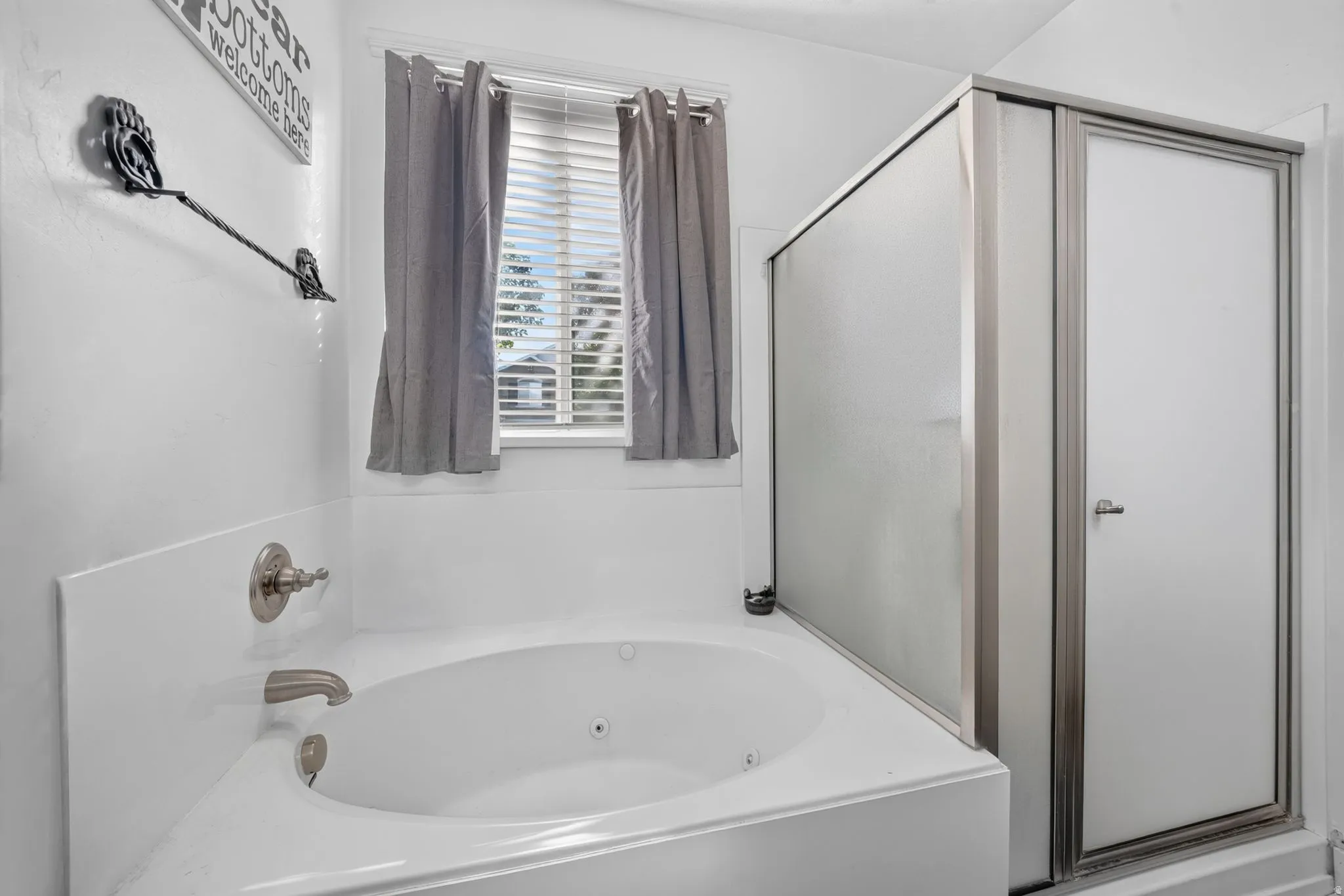 Deep soaking jetted tub and separate shower