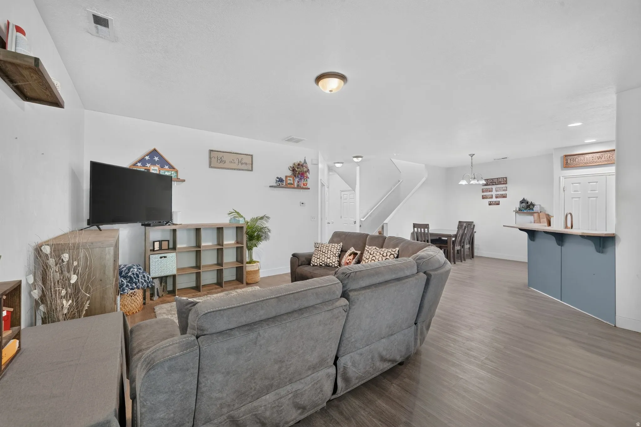 Open-concept living/dining/kitchen area